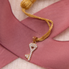 14K whitegold key-shaped pendant